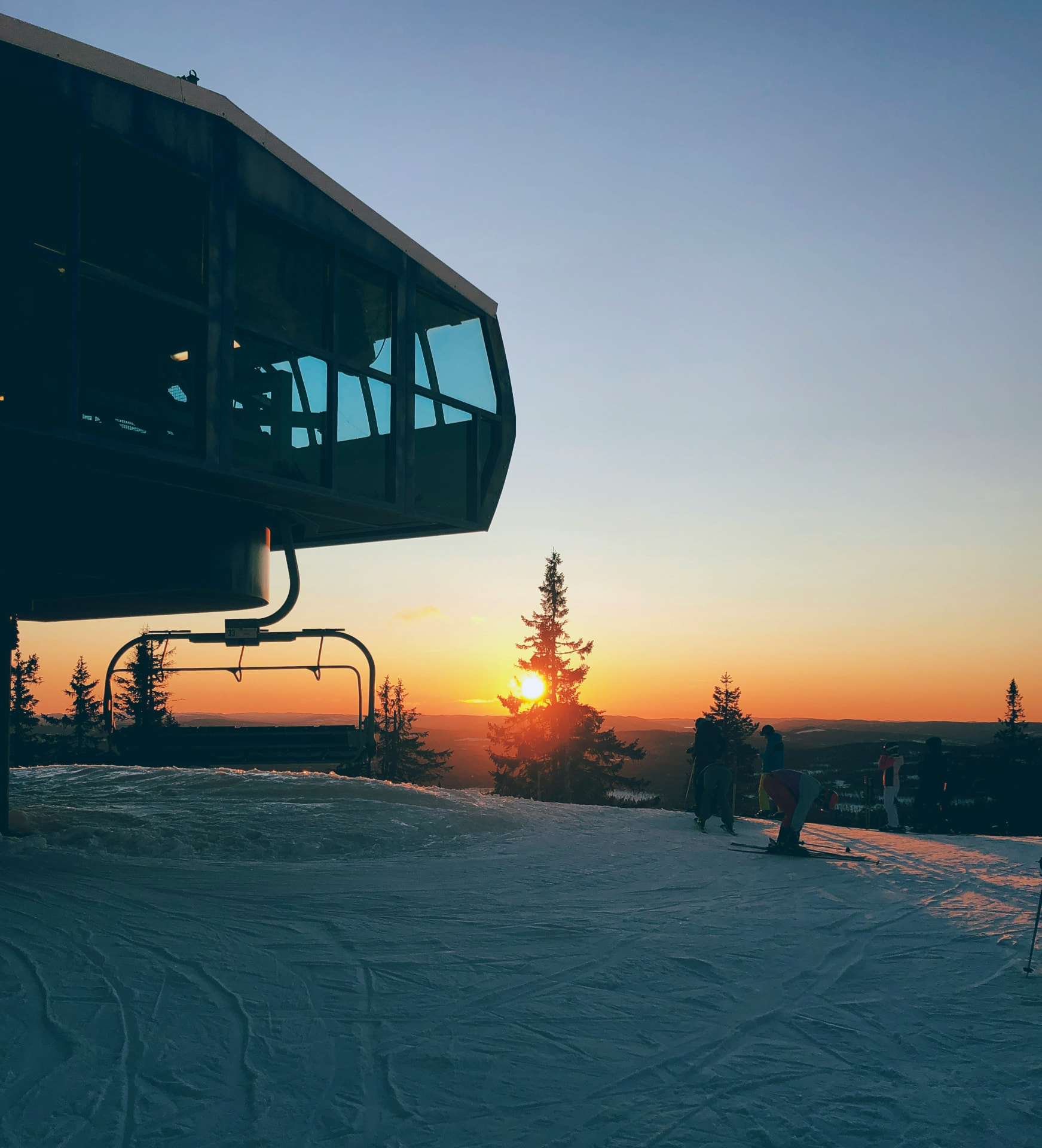 Ski lift at sunset above Trysilfjellet in winter